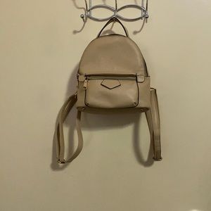 Tan. Mini Bookbag. Ross or Marshalls.